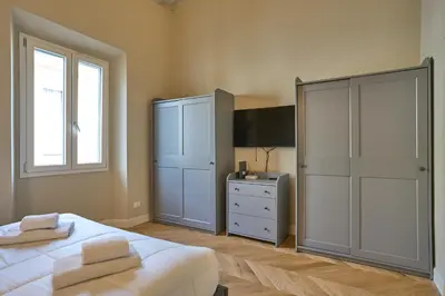 Letto o letti in una camera di Modern Penthouse with Terrace San Frediano