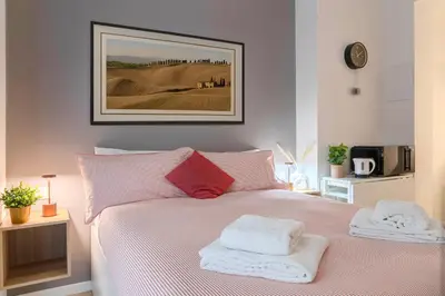 Letto o letti in una camera di Ponte Vecchio Suite 29