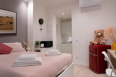 Letto o letti in una camera di Ponte Vecchio Suite 29