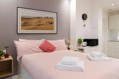 Letto o letti in una camera di Ponte Vecchio Suite 29