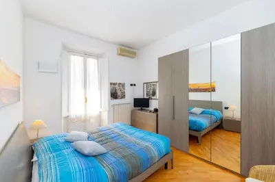 Letto o letti in una camera di Comfortable and functional, terrace and parking