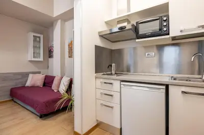 Cucina o angolo cottura di SMN Station Apartment by Maison Florence