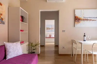 Area soggiorno di SMN Station Apartment by Maison Florence
