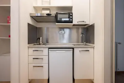Cucina o angolo cottura di SMN Station Apartment by Maison Florence