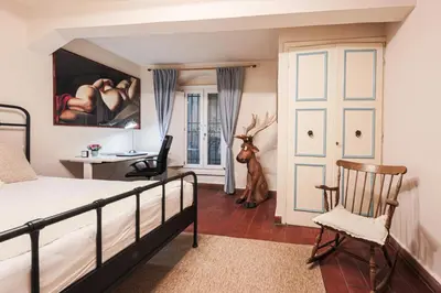 Letto o letti in una camera di Apartments Florence - The Rose of Florence