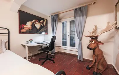 Letto o letti in una camera di Apartments Florence - The Rose of Florence