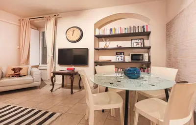 TV o dispositivi per l'intrattenimento presso Apartments Florence - The Rose of Florence