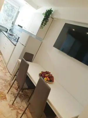 Cucina o angolo cottura di Rose apartment - 5 min centro - comfort ed eleganza