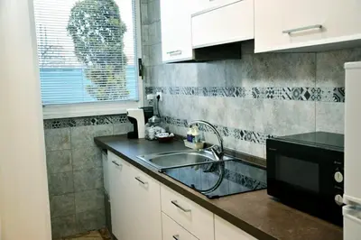 Cucina o angolo cottura di Rose apartment - 5 min centro - comfort ed eleganza