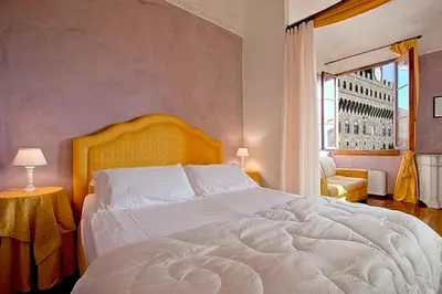 Letto o letti in una camera di Magic Signoria Apartment