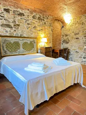Letto o letti in una camera di Il Nido del Viaggiatore