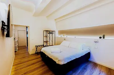 Letto o letti in una camera di Arno Charm Stay - San Frediano - Florence Italy