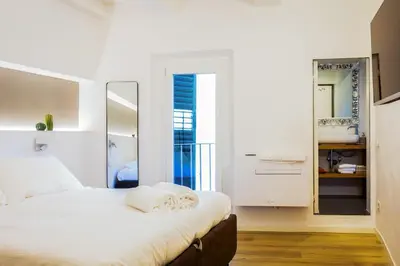 Letto o letti in una camera di Arno Charm Stay - San Frediano - Florence Italy