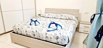 Letto o letti in una camera di GreenSuite