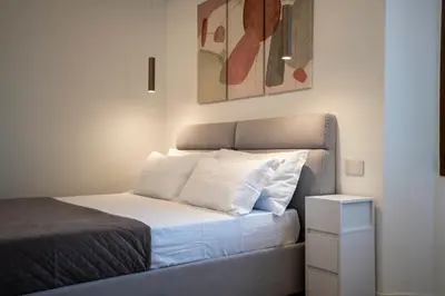 Letto o letti in una camera di Apartment Aria Florence 5 min da SF SMN