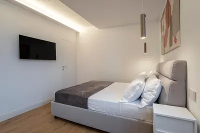 Letto o letti in una camera di Apartment Aria Florence 5 min da SF SMN