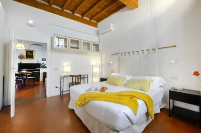 Letto o letti in una camera di Bombarde - Flo Apartments