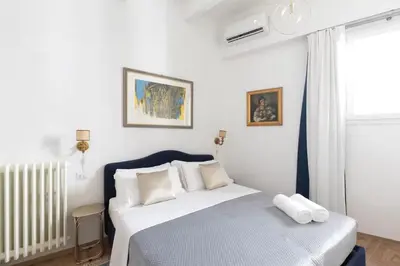 Letto o letti in una camera di CamilaCasaDeFirenze V3