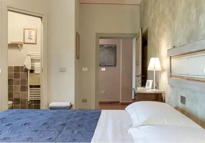 Letto o letti in una camera di Villa Porcigliano Olive Grove