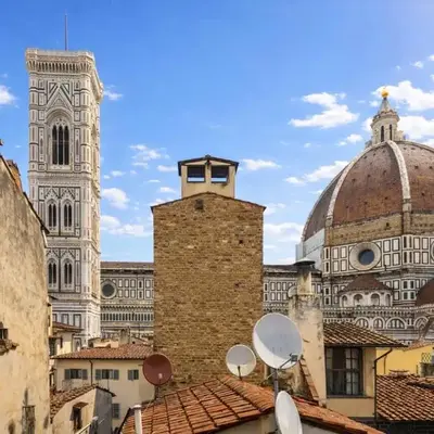 In front of the Duomo