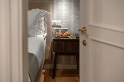Letto o letti in una camera di Dimora della Quiete - Firenze centro Fortezza