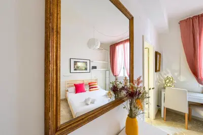 Letto o letti in una camera di CozySignoriaVenere