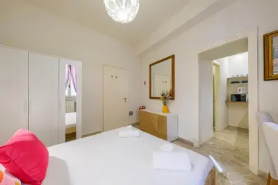 Letto o letti in una camera di CozySignoriaVenere