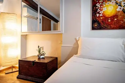 Letto o letti in una camera di Roommo Carmine