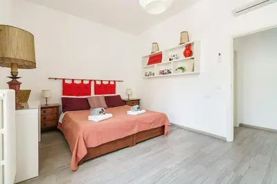 Letto o letti in una camera di Casa Chianti, Firenze