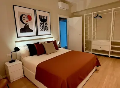 Letto o letti in una camera di A Casa di Cleo Urban Chic and Comfort