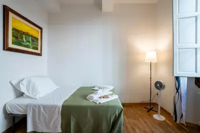 Letto o letti in una camera di 2br historic center, perfect for visiting Florence