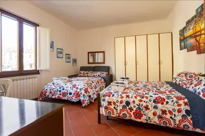 Letto o letti in una camera di La casa di Nonna Ida