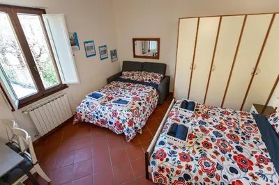Letto o letti in una camera di La casa di Nonna Ida
