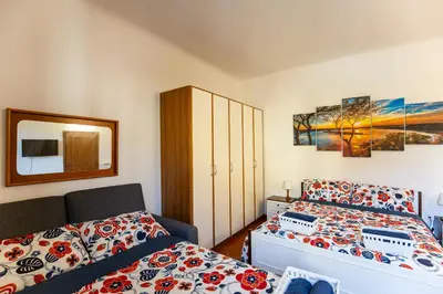 Letto o letti in una camera di La casa di Nonna Ida