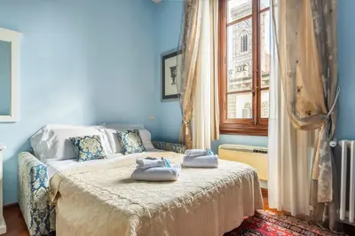 Letto o letti in una camera di Holiday AD Home Duomo, Firenze