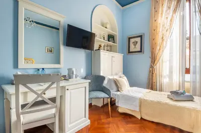 Letto o letti in una camera di Holiday AD Home Duomo, Firenze