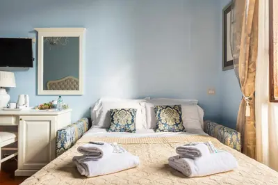 Letto o letti in una camera di Holiday AD Home Duomo, Firenze