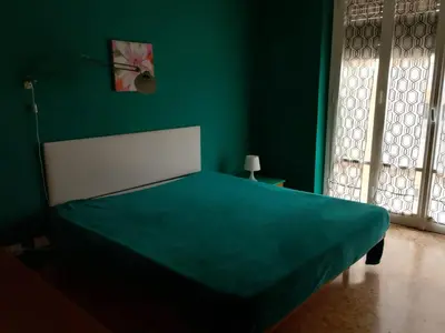 Letto o letti in una camera di Cascine