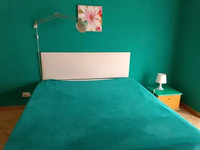 Letto o letti in una camera di Cascine