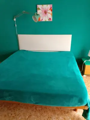 Letto o letti in una camera di Cascine