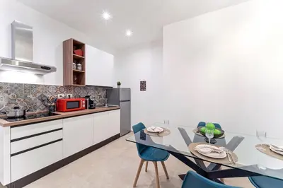 Cucina o angolo cottura di UNYCA - Florence Pitti Apartment
