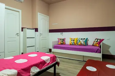Letto o letti in una camera di Cozy and charming triple room - ColivingFlorence VdM