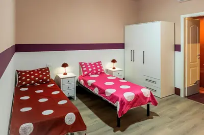 Letto o letti in una camera di Cozy and charming triple room - ColivingFlorence VdM