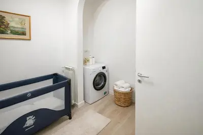Letto o letti in una camera di Steps from Santa Croce- Spacious with 2 bathrooms