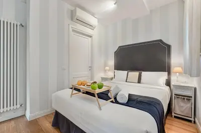 Letto o letti in una camera di Suites near Piazzale Michelangelo