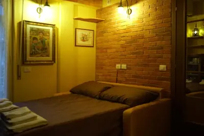 Letto o letti in una camera di Ponte Vecchio - Guicciardini n. 10