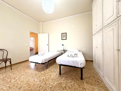 Letto o letti in una camera di Vintage Armonia 2BR apartment