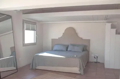 Letto o letti in una camera di Casa Zacch - Country house with terrace in the hills near Florence
