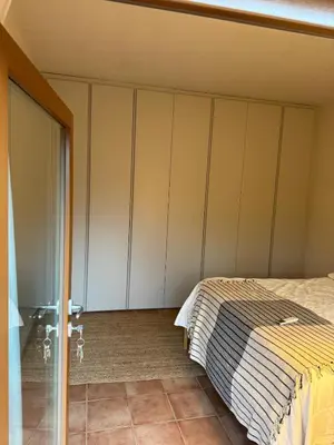 Letto o letti in una camera di Casa Zacch - Country house with terrace in the hills near Florence