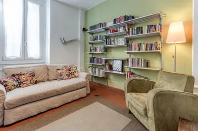 Area soggiorno di GardenHouseFirenze Familiare a 10 min dal centro,possibilità parcheggio-Careggi